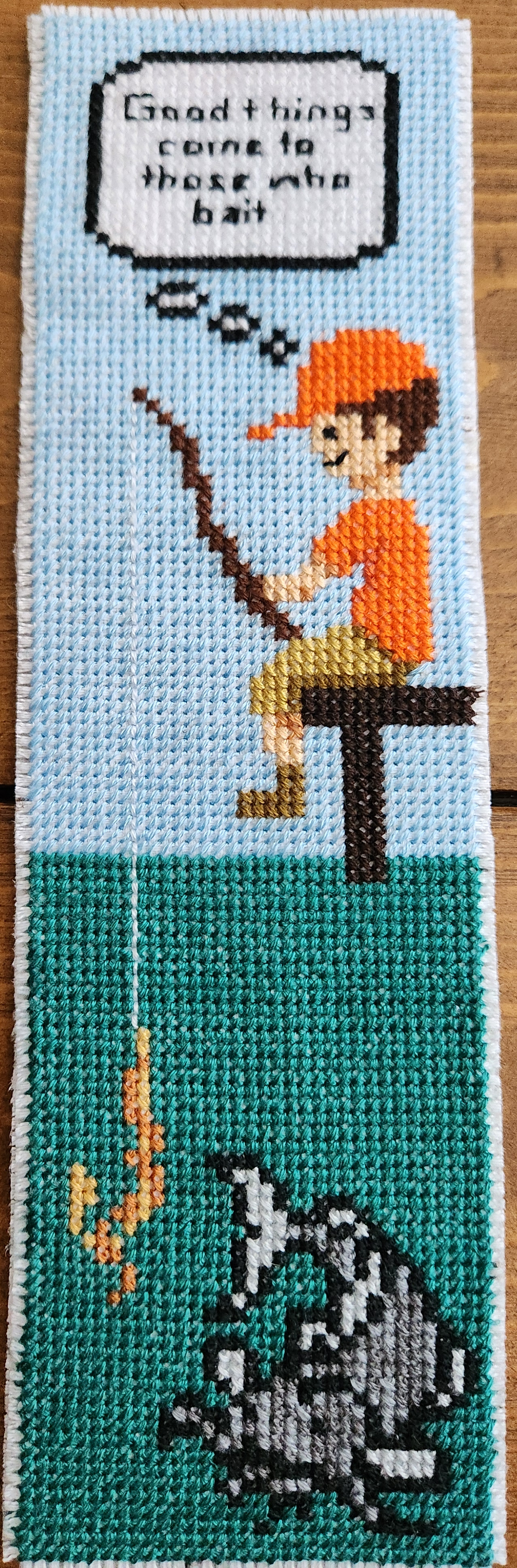 Boy fishing on pier bookmark